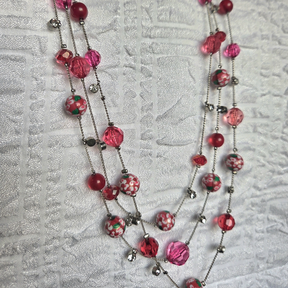 Multi-strand Layered Necklace With Pink Beads and Silver Tone Spacers